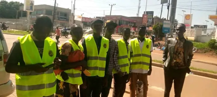 CAR outreach team in reflector vests before a market storming
